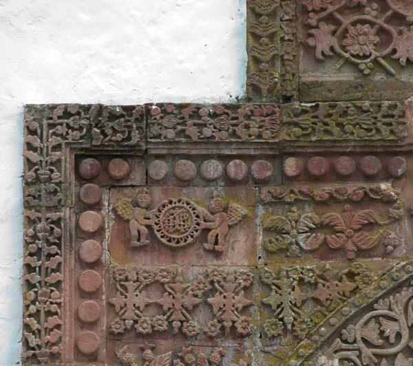 Façade portal, left spandrel - Santiago Apóstol