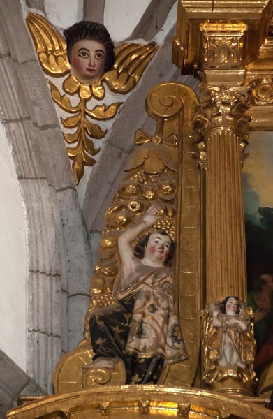San Bernardino, high altar, top tier, left angels - Xochimilco