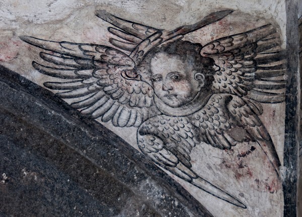 Upper cloister walk, arch spandrel mural - San Juan Evangelista, convento