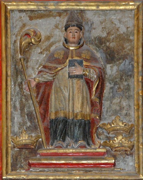 Top tier central relief, St. Augustine - San Miguel Arcángel, nave San Agustín retablo