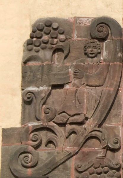 San Bernardino de Sena, façade, angel volute left - Xochimilco