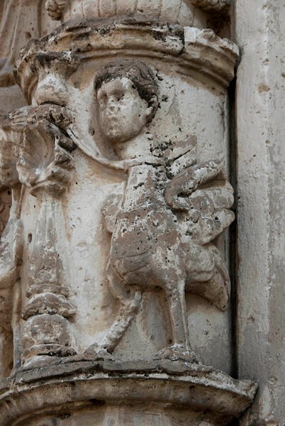 Façade portal, column relief (right) - San Pablo, façade, portería & convento