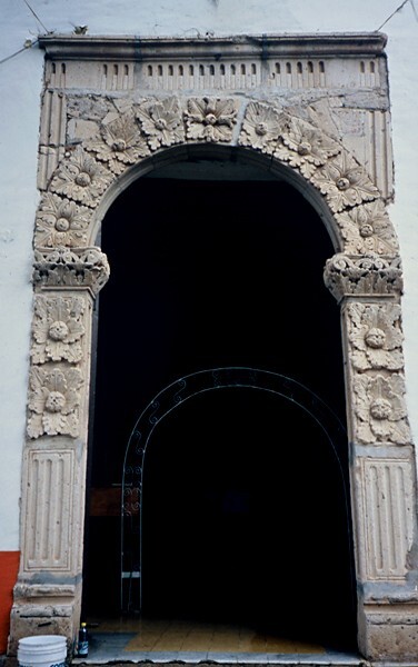 San Pedro, façade, main portal - Barrio Chapels
