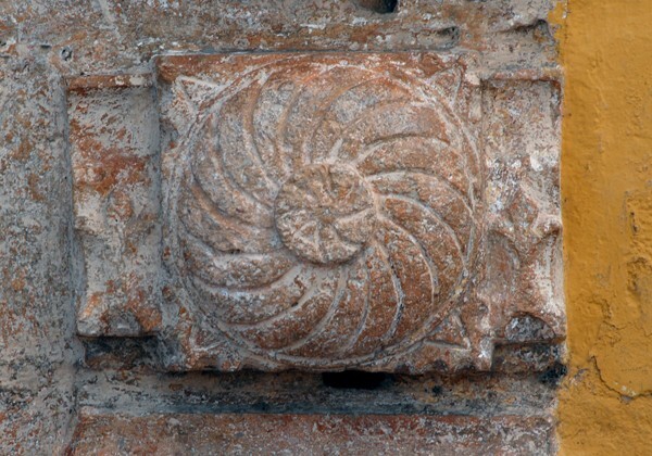 San Bernardino de Sena, façade, pillar base rosette - Tetiz, Yucatán