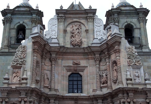 Façade top tier, choir loft window, bell-towers & gable - La Soledad