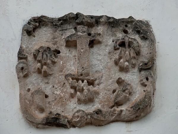 San Miguel, façade alfiz right relief, Cross & wounds - San Miguel Huautla, Oaxaca