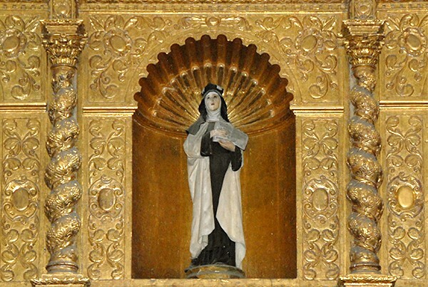 High altar, second tier, central niche sculpture, St. Teresa of Avila - La Candelaria