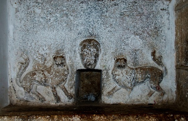 SS Pedro y Pablo, lower cloister ambulatory, friars seat, relief - Etla, Oaxaca, San Pedro y San Pablo