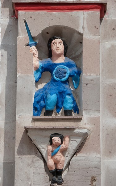 San Juan Bautista, façade portal, left pilaster sculpture, St. Michael - Chiautla, México