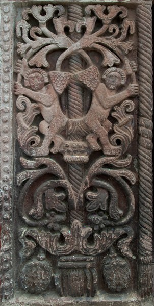 Façade portal, left pilaster relief - Santiago Apóstol