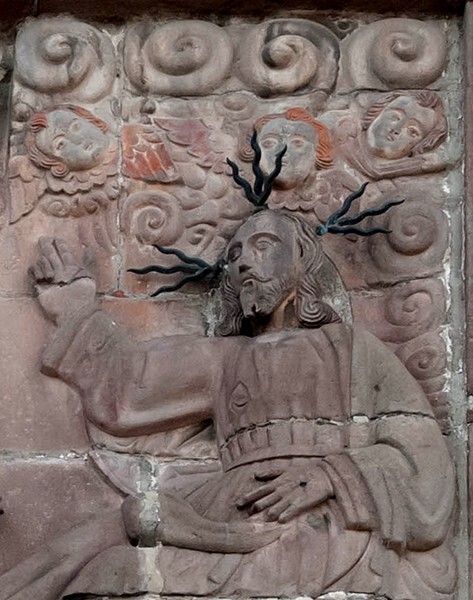 Façade, central relief, St. John of God washing Christ's feet, detail - San Juan de Dios