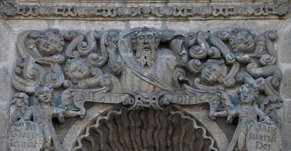 Façade, sculpture niche relief, God the Father with cherubim - San Bernardo
