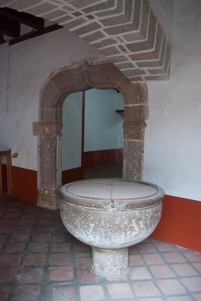 Santa María, baptismal font & cloister door - Tlatlauquitepec, Puebla