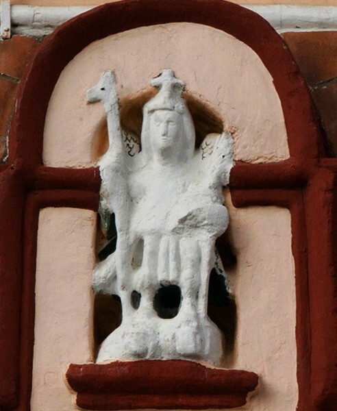 San Miguelito, façade portal, archivolt sculpture, St. Michael - San Miguelito