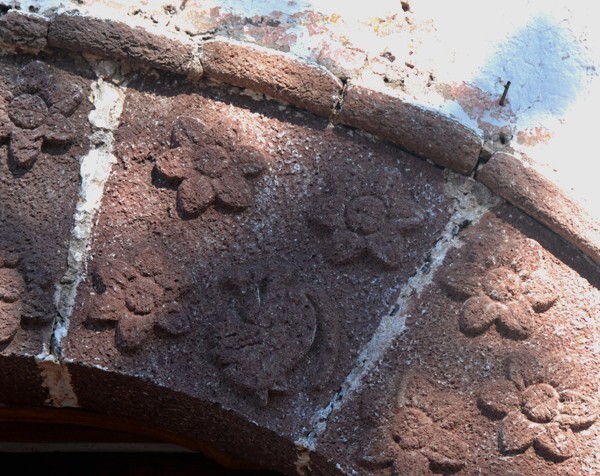 La Asunción, façade, main portal archivolt, rosette & rabbit reliefs - Asunción Chiconcuac, Hidalgo