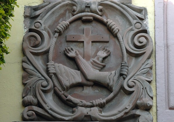 Rear portal, Franciscan insignia - Santa Clara
