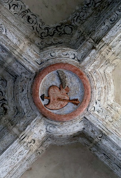 Lower cloister walk, rib vault boss, pierced heart - Cloister