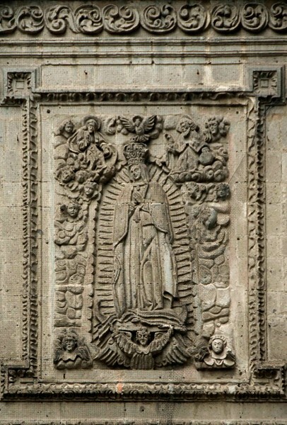 Façade, central relief - San Juan Evangelista y La Guadalupe