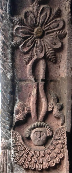 Façade portal, left pilaster relief relief (left) - Santiago Apóstol