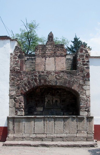 Atrial wall, aljibe - Façade, lateral portal, gate cross, posa chapel, apse & atrial wall