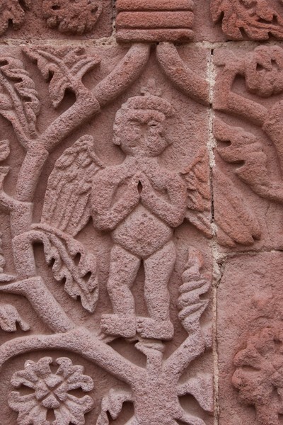 Façade portal, left pilaster relief, cherub - San Francisco & capilla abierta