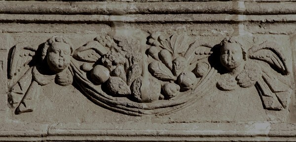 Façade, main portal, architrave relief - San Juan Bautista
