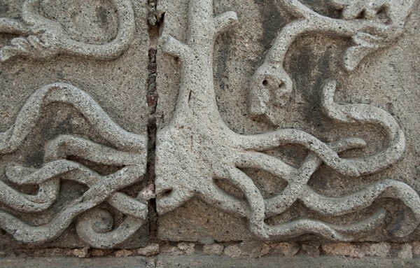 Façade portal, left pilaster base detail - Iglesia Sanctorum