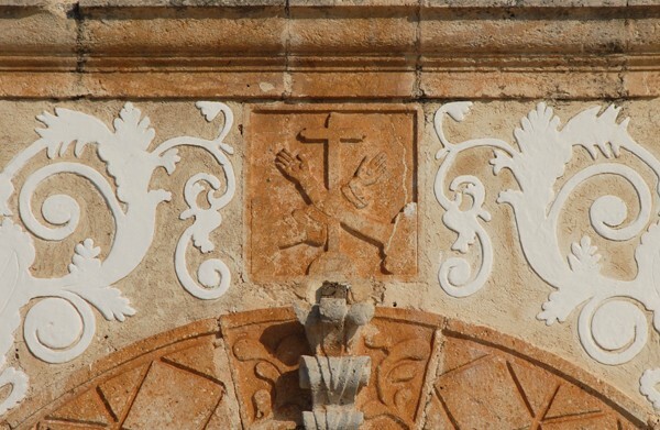 Santa Ana, façade, main portal architrave, Franciscan insignia - Dzemul, Yucatán