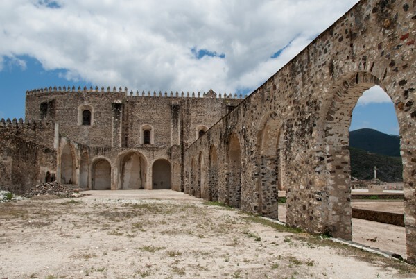 Capilla abierta & W exterior nave wall - Façade, exterior buttressing, lateral portal, open & posa chapels, atrio & cross