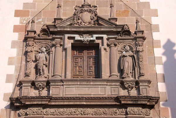 Façade, upper story & choir loft window - Santiago