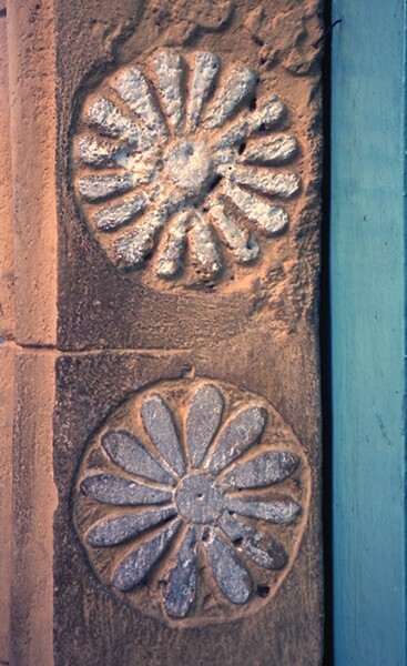 Façade portal, left jamb rosettes - Santo Domingo