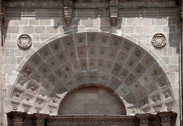 Façade portal, coffered archivolt - San Nicolás de Tolentino, façade, bell-tower, portería & nave