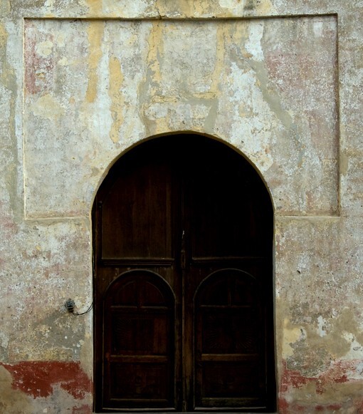 Façade portal - San Juan Bautista, facade, convento, cloister & lower walk murals