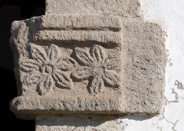 San Felipe, façade, main portal, right door impost relief - San Felipe de los Alzati, Michoacán