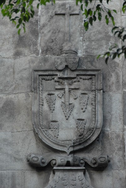 Right portal relief, Franciscan insignia - Santa Clara