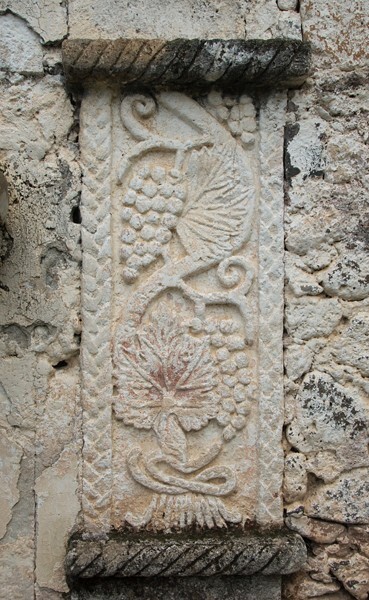 San Juan Bautista, façade portal, left pilaster relief - Atzolcintla, Hidalgo