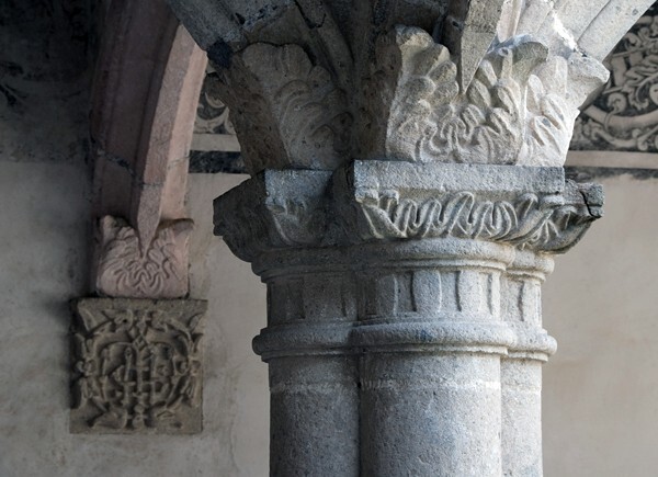 Lower cloister walk, arch capitals - San Andrés, cloister with murals