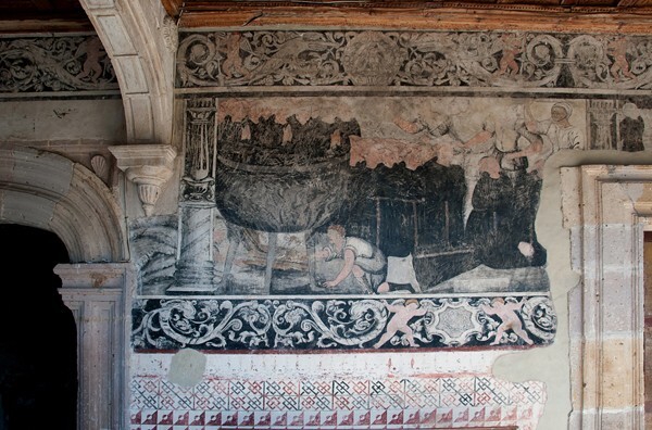 W wall, friars boiled alive - San Miguel Arcángel, cloister with murals