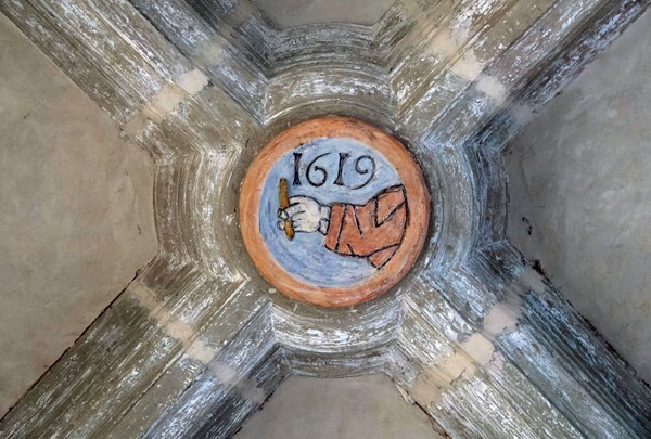 Lower cloister walk, ribbed vault boss with date - Cloister