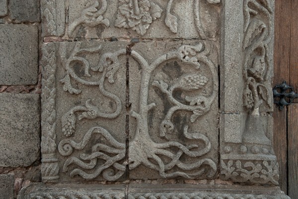 Façade portal, left pilaster base - Iglesia Sanctorum