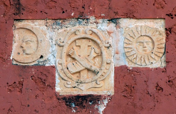 Santa Inés, façade reliefs, moon, sun & Franciscan insignia - Akil, Yucatán