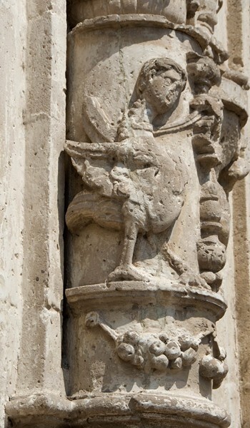 Façade portal, column relief (left) - San Pablo, façade, portería & convento