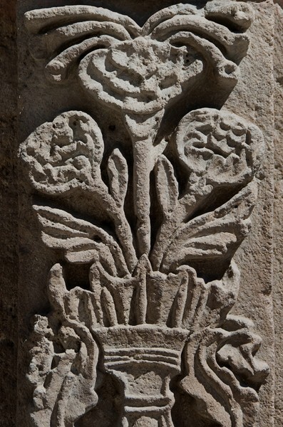 Façade portal, left pilaster relief - Palacio de Gobierno