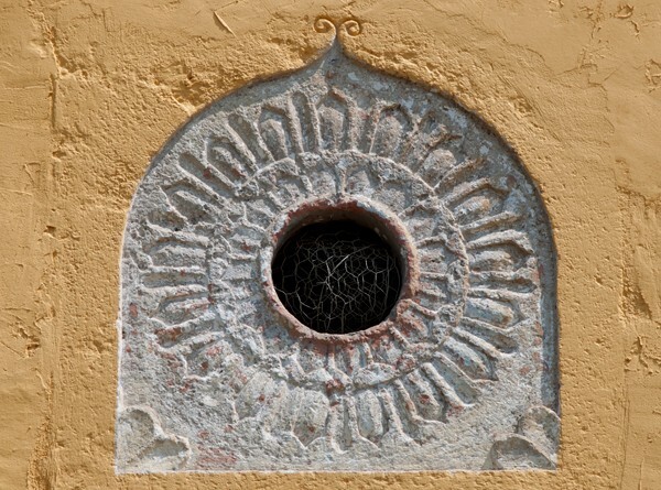 San Pedro, bell-tower, embedded chalchihuitl - Tlachichilco, Hidalgo