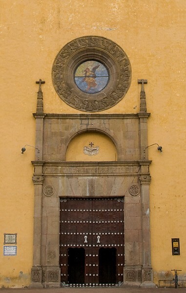 San Gabriel, façade, main portal alfiz & choir loft window - San Gabriel, church, posas & novitiate