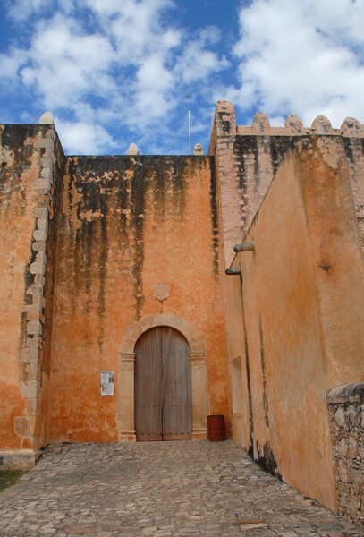 San Miguel Arcángel, S portal & exterior buttressing - Maní, San Miguel Arcángel