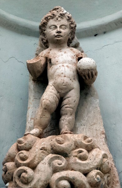 Sacristry portal, putto - La Soledad