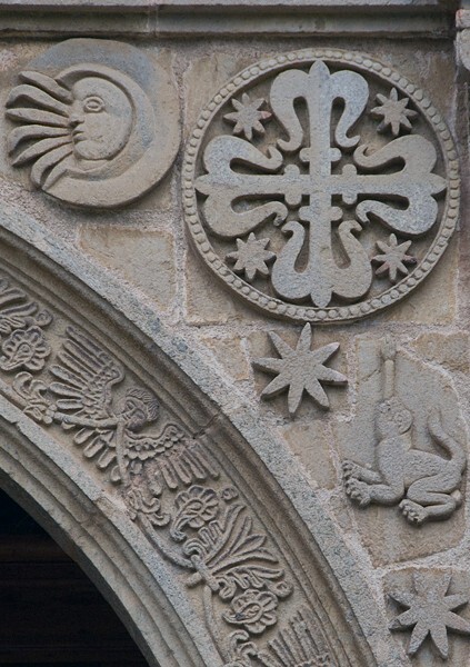 Façade portal, right spandrel - Façade, nave & sanctuary