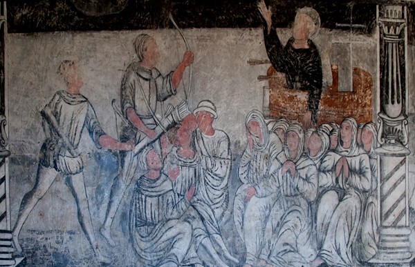 S wall, friar pierced by arrows - San Miguel Arcángel, cloister with murals