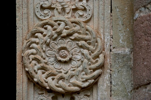 SS Pedro & Pablo, façade portal, right pilaster rosette - San Pedro y San Pablo